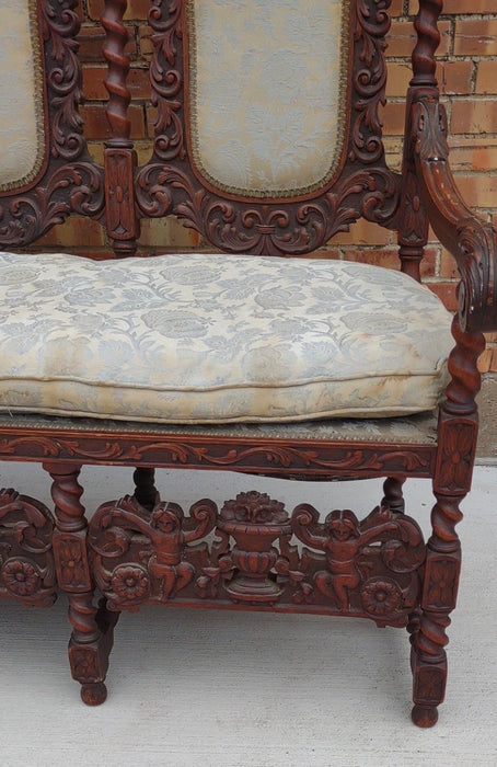 LOUIS XIII BARLEY TWIST SETTEE WITH CHERUBS