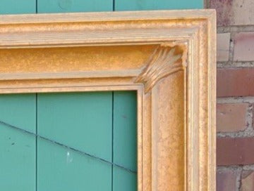 LARGE GOLD CONCAVE FRAME WITH REEDING