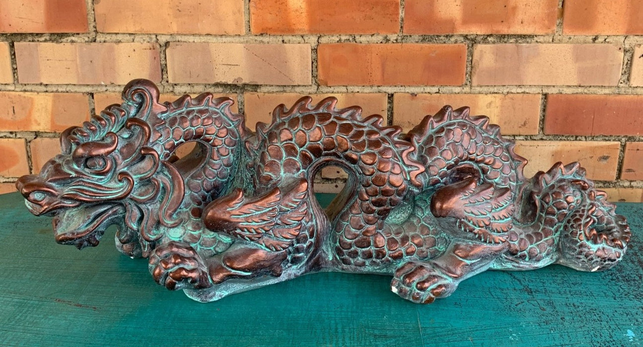 PLASTER BROWN AND GREEN PAINTED DRAGON STATUE