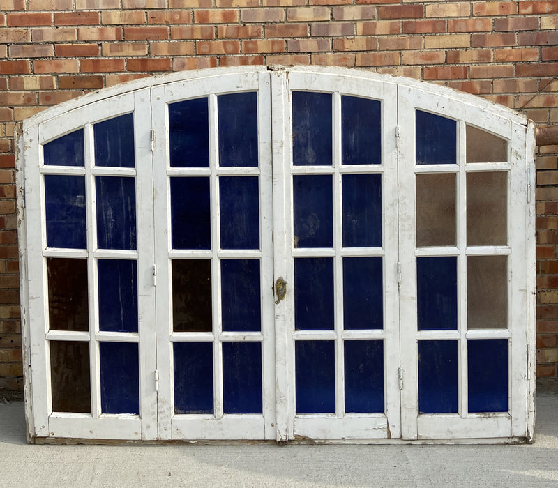 LARGE PRIMITIVE ARCHED WOODEN FRAMED MULTICOLORED WINDOW
