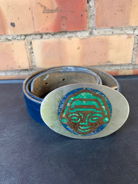 GREEN AND SILVER BUCKLE WITH FACE OF INDIGENOUS PERSON ON BELT