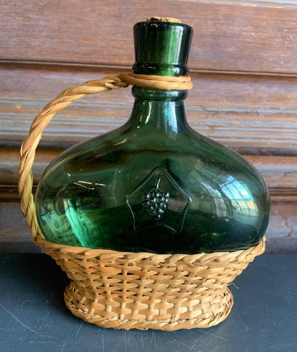 SMALL WINE BOTTLE IN WICKER BASKET