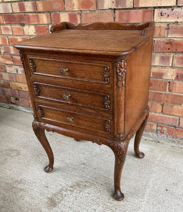 CARVED OAK 3 DRAWER LAMP STAND WITH QUEEN ANNE FEET