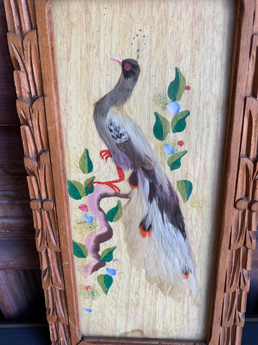 MEXICAN PAINTING OF BIRD WITH FEATHERS IN CARVED FRAME