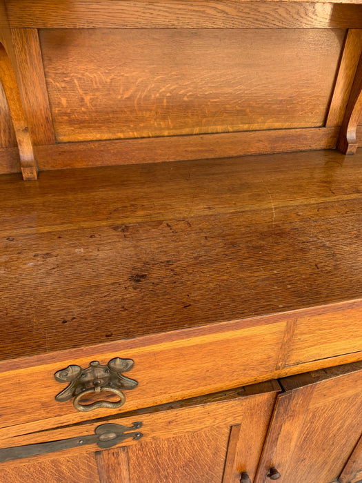 ARTS AND CRAFTS OAK SIDEBOARD WITH BLOWN GLASS