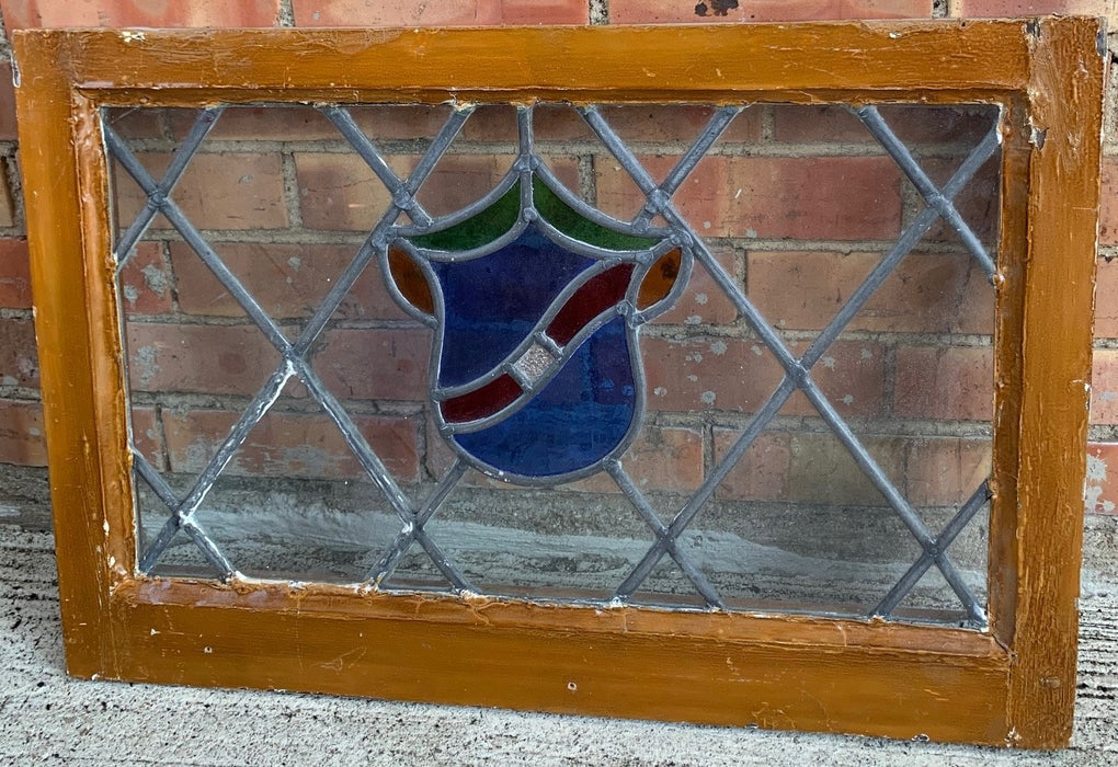 STAINED GLASS CREST WINDOW WITH CLEAR FIELD