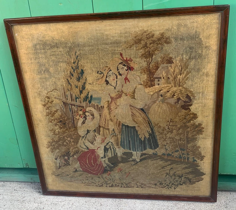 FRAMED LATE 19TH CENTURY NEEDLEPOINT OF WOMEN AND CHILDREN