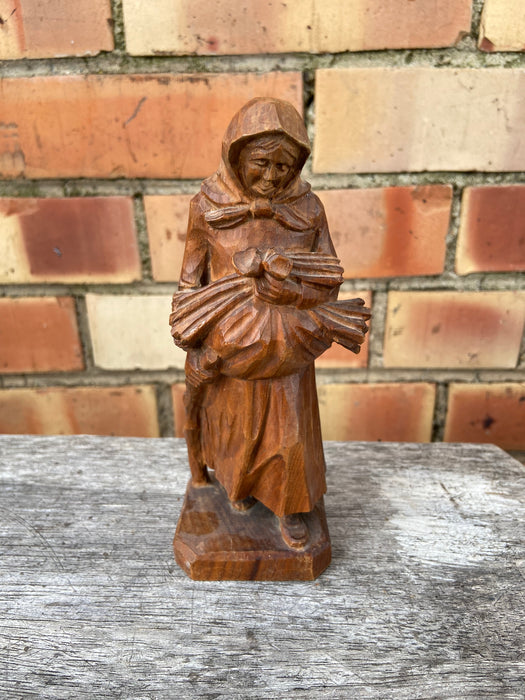 SMALL WOOD CARVING OF WOMAN WALKING