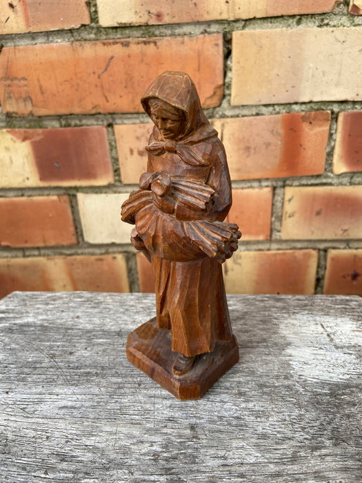 SMALL WOOD CARVING OF WOMAN WALKING