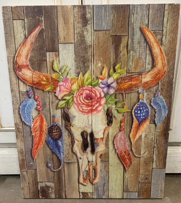 NOT OLD PRINT ON WOOD OF COW SKULL WITH FEATHERS