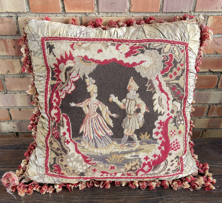 NEEDLE POINT PILLOW OF PEOPLE WITH TASSELS