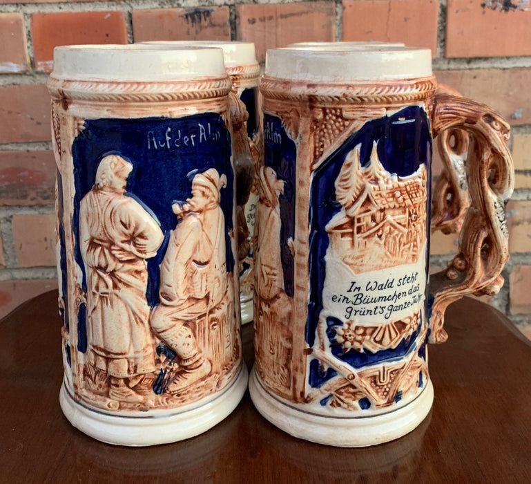 SET OF 4 GERMAN STEINS MADE IN JAPAN