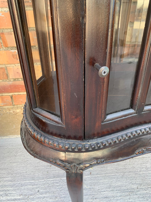 CHOCOLATE KIDNEY SHAPED CABINET WITH BEVELED GLASS AND REMOVABLE TRAY