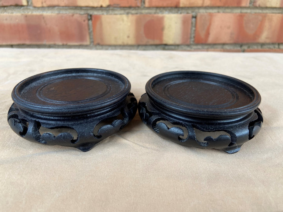 PAIR OF TINY  ROUND BLACK ASIAN PIERCE CARVED STANDS