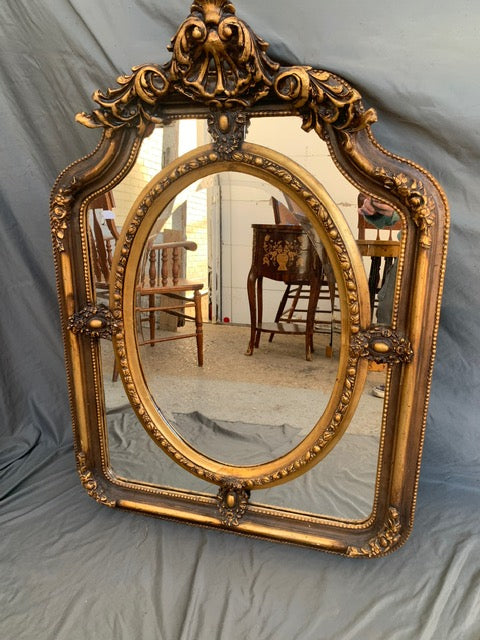 LOUIS XV VERTICAL MULTI PANELED MIRROR WITH OVAL CENTER