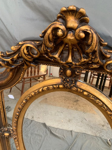 LOUIS XV VERTICAL MULTI PANELED MIRROR WITH OVAL CENTER