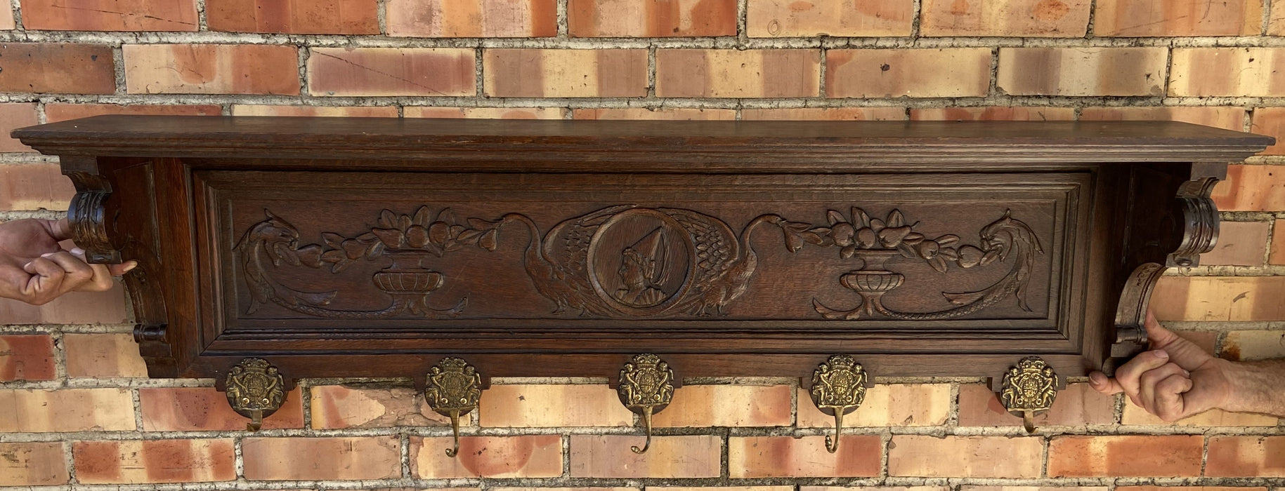 LADY AND SWAN CARVED OAK WALL RACK