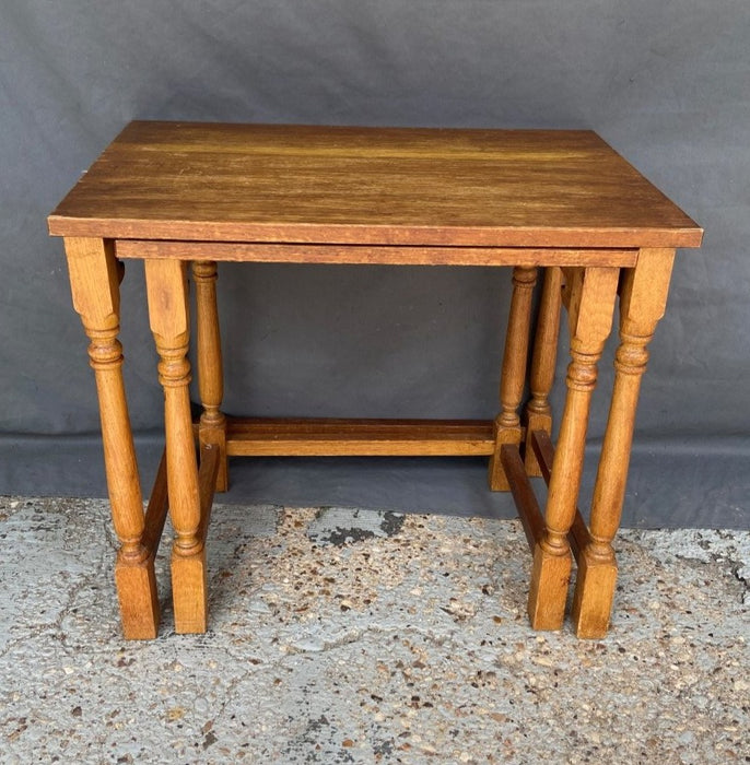 PAIR OF BLOCK AND TURNED OAK NESTING TABLES