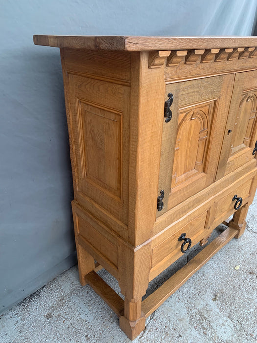 RUSTIC OAK 2 DOOR CABINET WITH CORBELS AND LOWER DRAWER