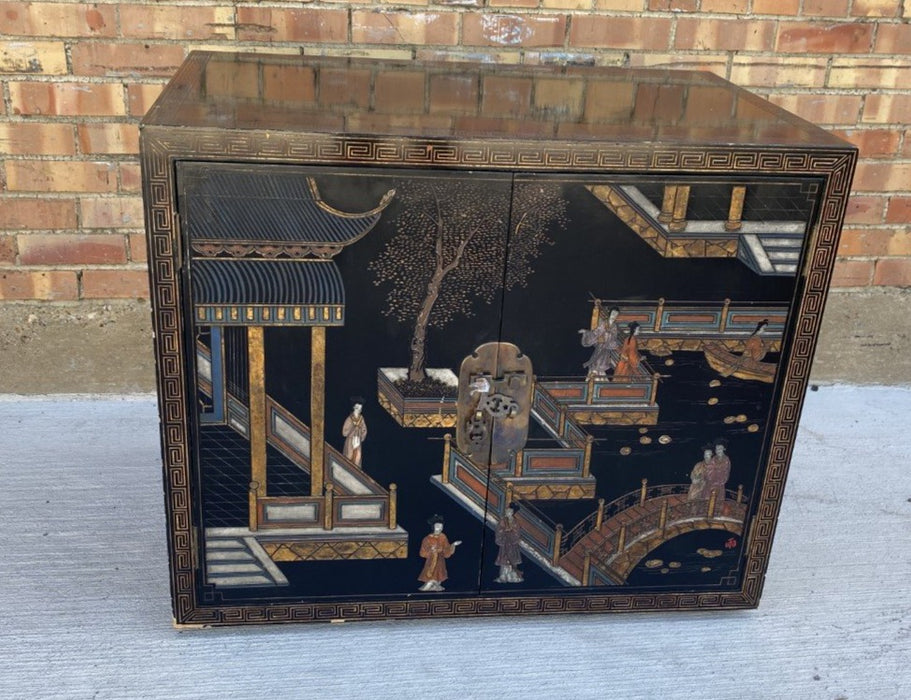 PAIR OF ASIAN BLACK LACQUER STANDS WITH SCENES