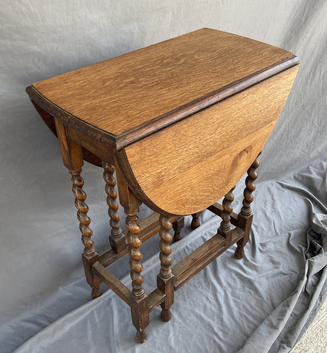 PETITE TIGER OAK DROP LEAF BARLEY TWIST TABLE