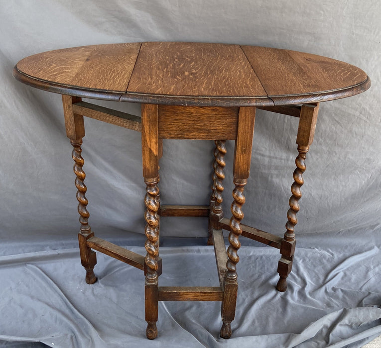 PETITE TIGER OAK DROP LEAF BARLEY TWIST TABLE