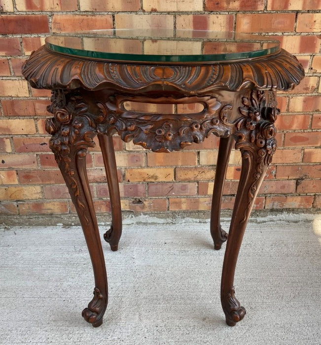 1930'S LARGE ORNATELY CARVED CROSS BANDED TABLE