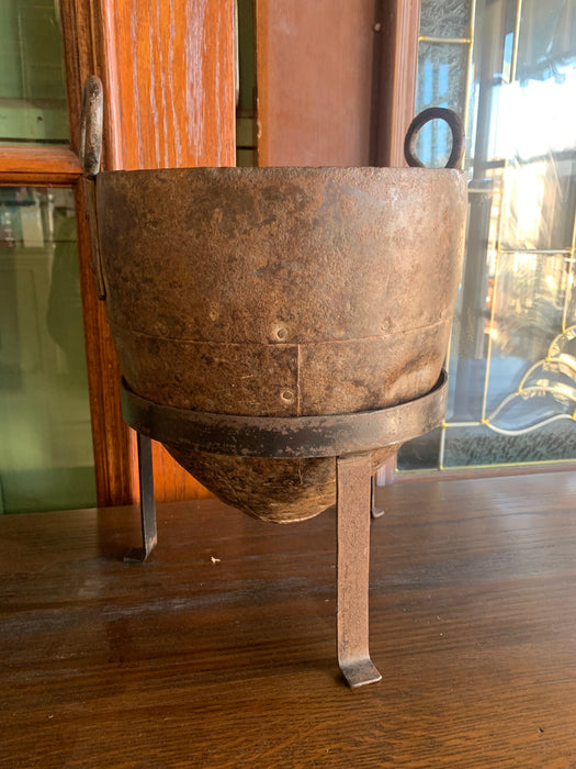 BULLET SHAPED IRON BUCKET IN STAND