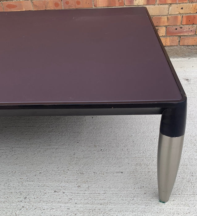 EBONIZED COFFEE TABLE WITH CHROME LEGS AND GLASS TOP