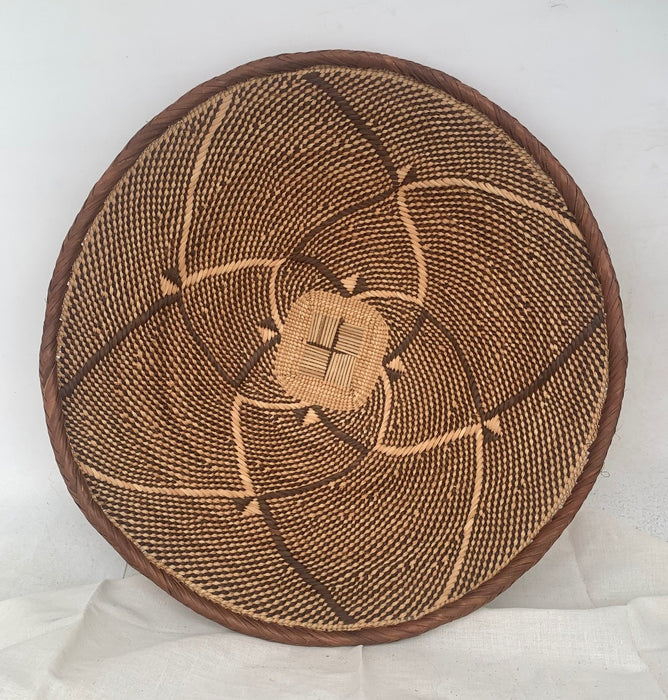 SHALLOW AFRICAN BASKET WITH SWIRL DESIGN
