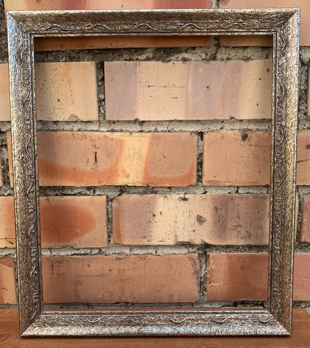 TINY SILVER AND BROWN FRAME