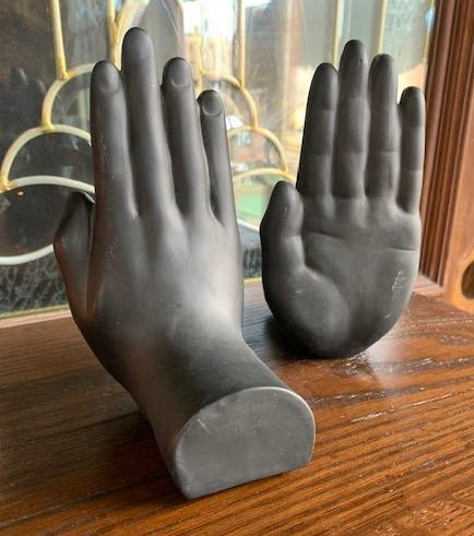 PAIR OF BLACK HAND BOOKENDS