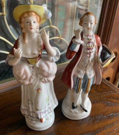 PAIR OF MALE AND FEMALE FIGURINES