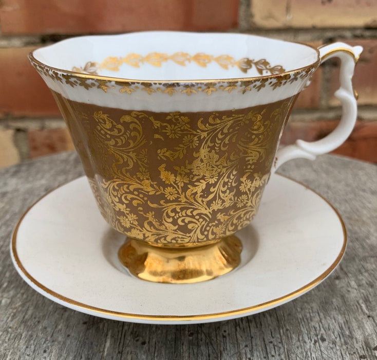 GOLD AND WHITE ROYAL ALBERT CUP AND SAUCER