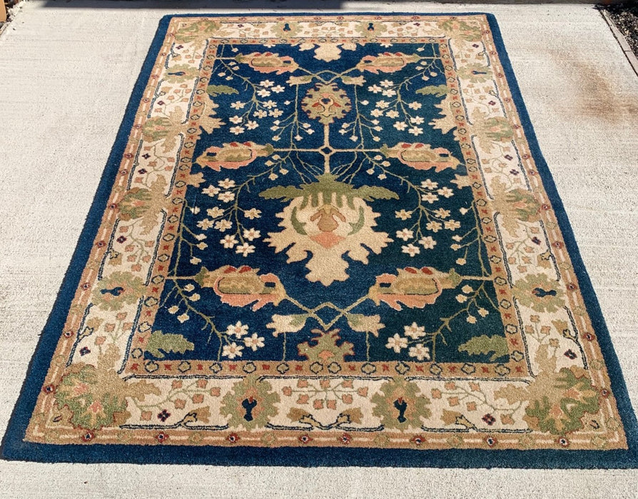 BLUE AND GOLD 66" X 96" AREA RUG