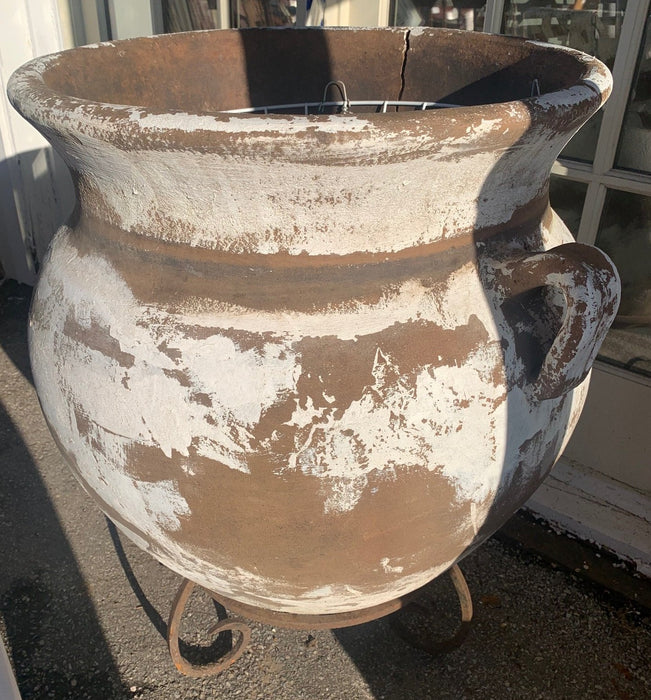 AS IS CRACKED HUGE TERRA COTTA POT ON IRON BASE