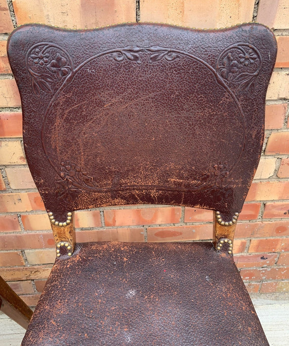 PAIR OF EMBOSSED LEATHER SIDE CHAIRS