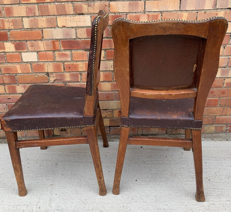 PAIR OF EMBOSSED LEATHER SIDE CHAIRS