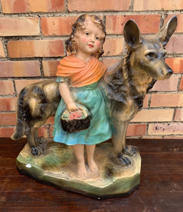 CHALK GIRL AND GERMAN SHEPARD STATUE