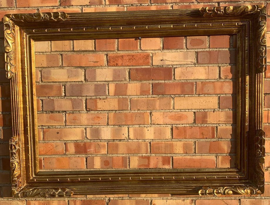 LARGE BRIGHT GOLD WOOD FRAME WITH RAISED CORNERS