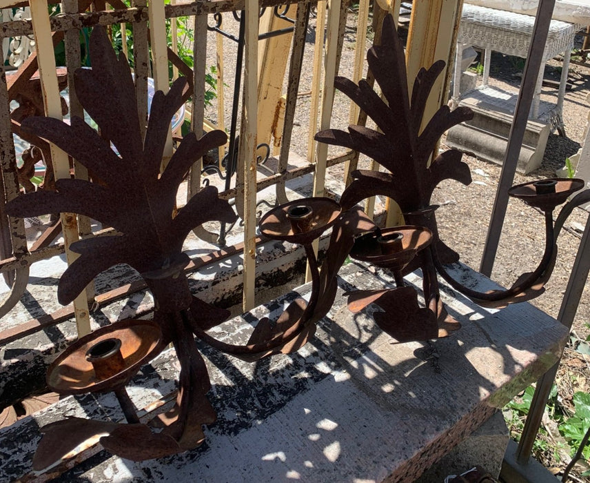 PAIR OF RUSTY CANDLE SCONCES
