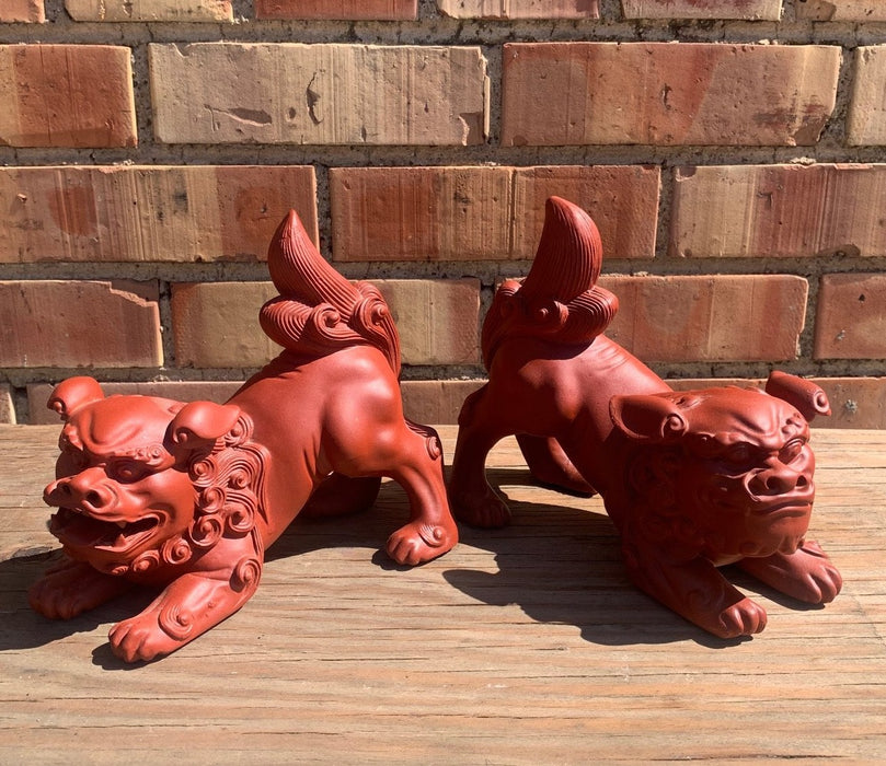 PAIR OF RED RESIN FOO DOGS