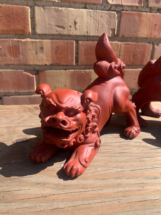 PAIR OF RED RESIN FOO DOGS