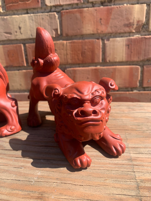 PAIR OF RED RESIN FOO DOGS