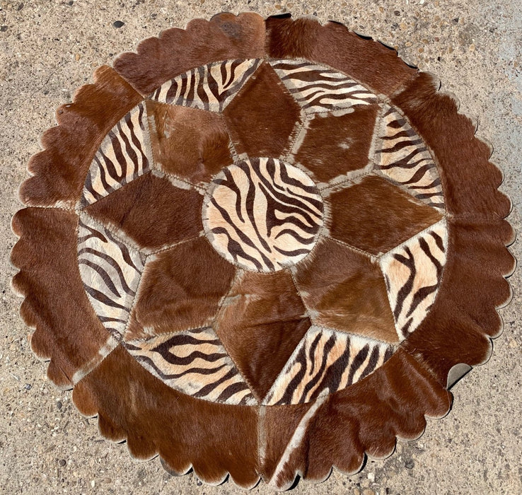 COWHIDE AND ZEBRA PATTERN ROUND LEATHER RUG