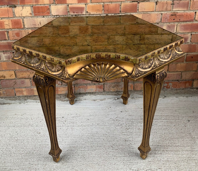 PENTAGON SHAPED GILT TABLE WITH MIRROR TOP AND SHELL CARVING