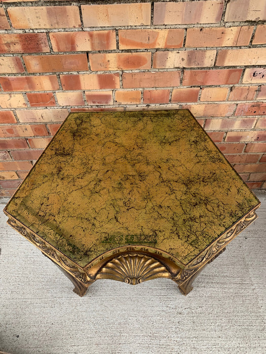 PENTAGON SHAPED GILT TABLE WITH MIRROR TOP AND SHELL CARVING