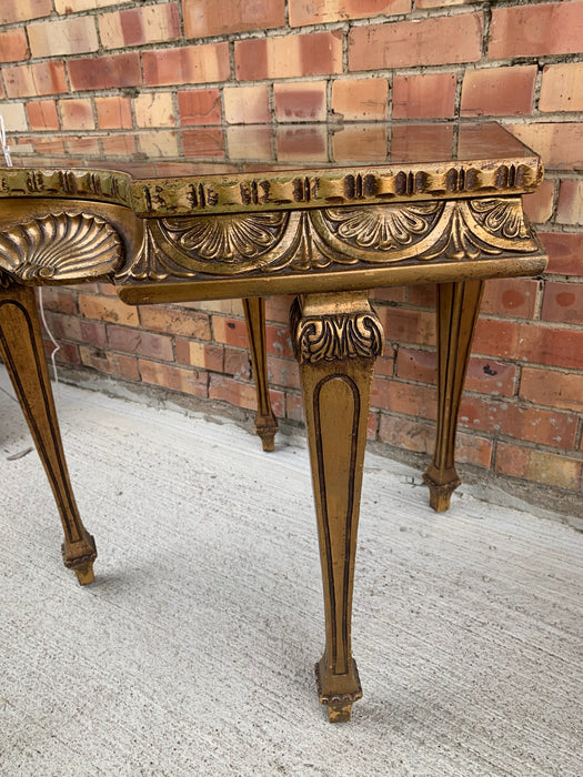 PENTAGON SHAPED GILT TABLE WITH MIRROR TOP AND SHELL CARVING