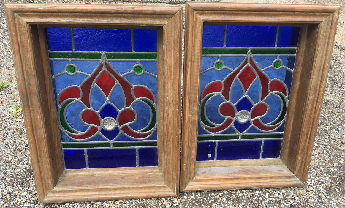 PAIR OF SMALL RED AND BLUE STAINED GLASS WINDOWS WITH RONDELL