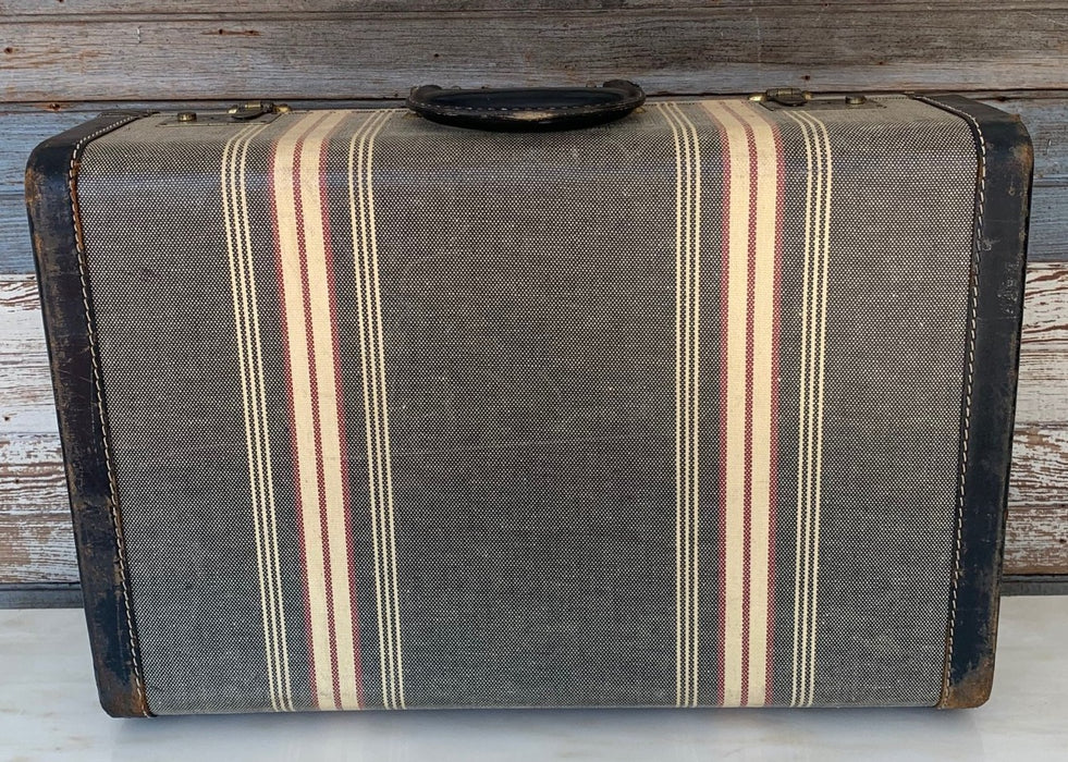 STRIPED SUITCASE WITH BLACK LEATHER